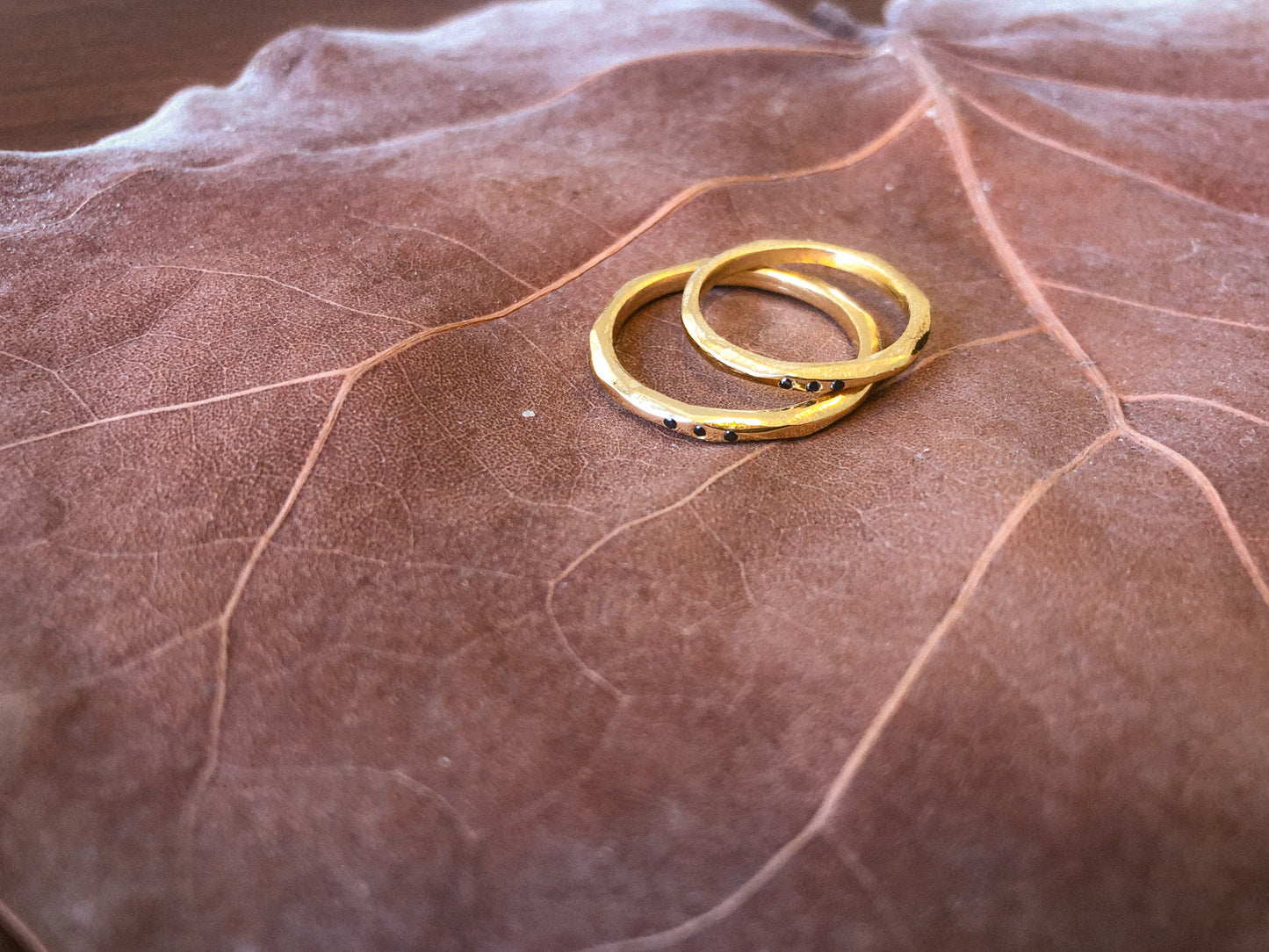 Faceted ring with stones